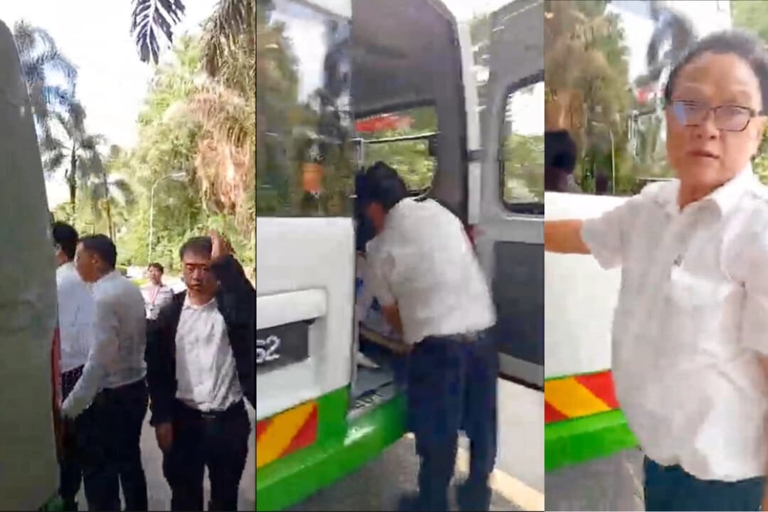 Individuos que se hacen pasar por policías chinos roban stand de Falun Gong en Malasia, según video