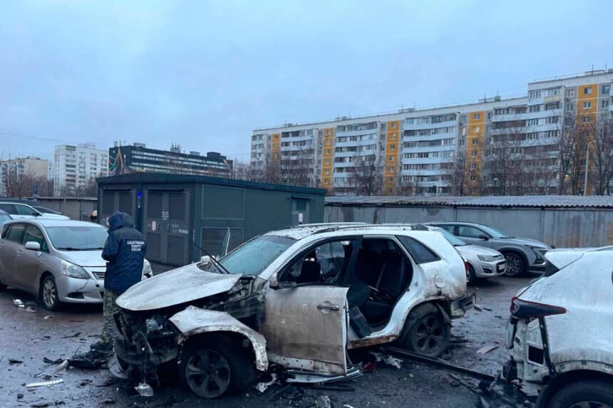 An investigator works at the scene where Lt. Gen. Fanil Sarvarov, head of the Operational Training Directorate of the Russian Armed Forces General Staff, was killed by an explosive device placed under his car in Moscow, in a photo provided by the Investigative Committee of Moscow on Dec. 22, 2025. Investigative Committee of Moscow via AP
