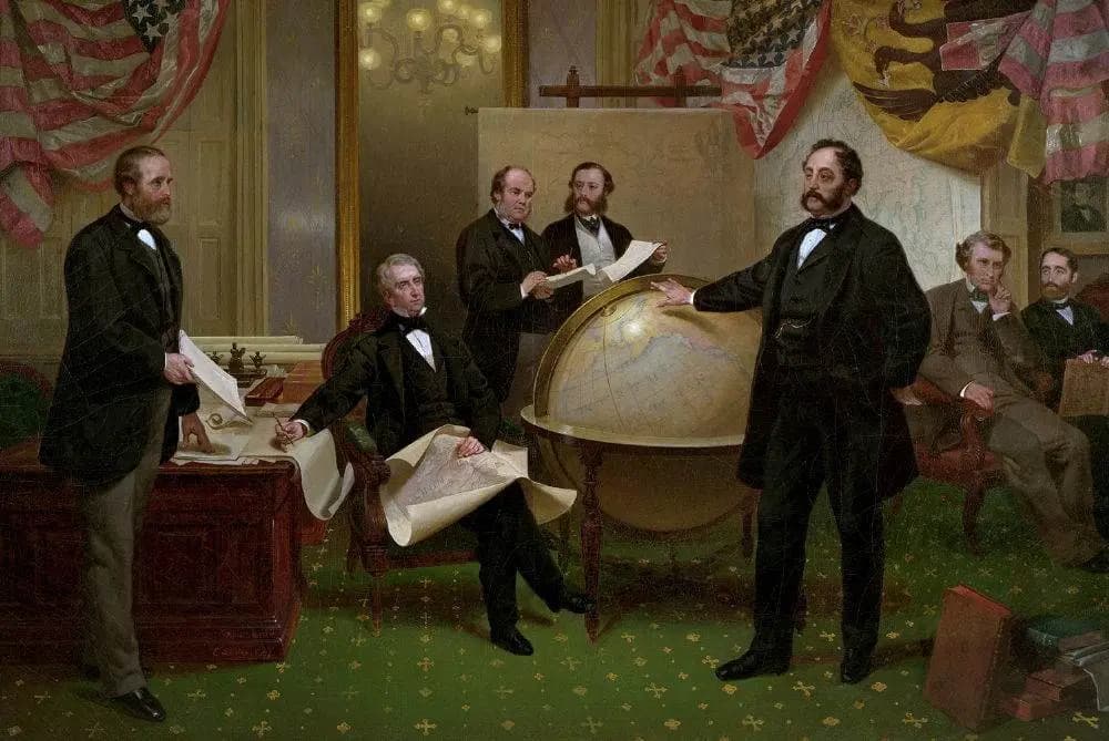 Firma de la compra de Alaska. El secretario de Estado William Seward está sentado en el centro. (Dominio público).
