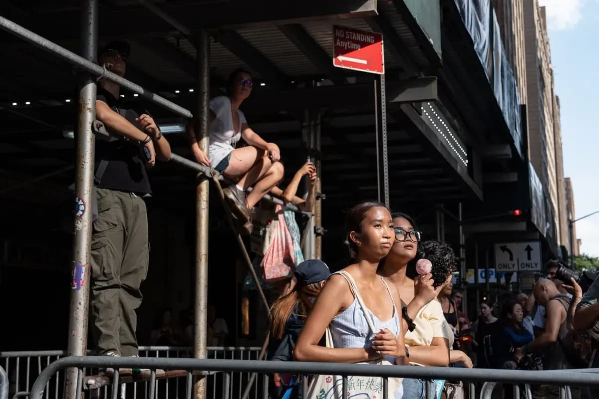 Taylor Swift fans look on ahead of Taylor Swift and Travis Kelce's wedding at Madison Square Garden in New York City on July 3, 2026.(Samira Bouaou/The Epoch Times).