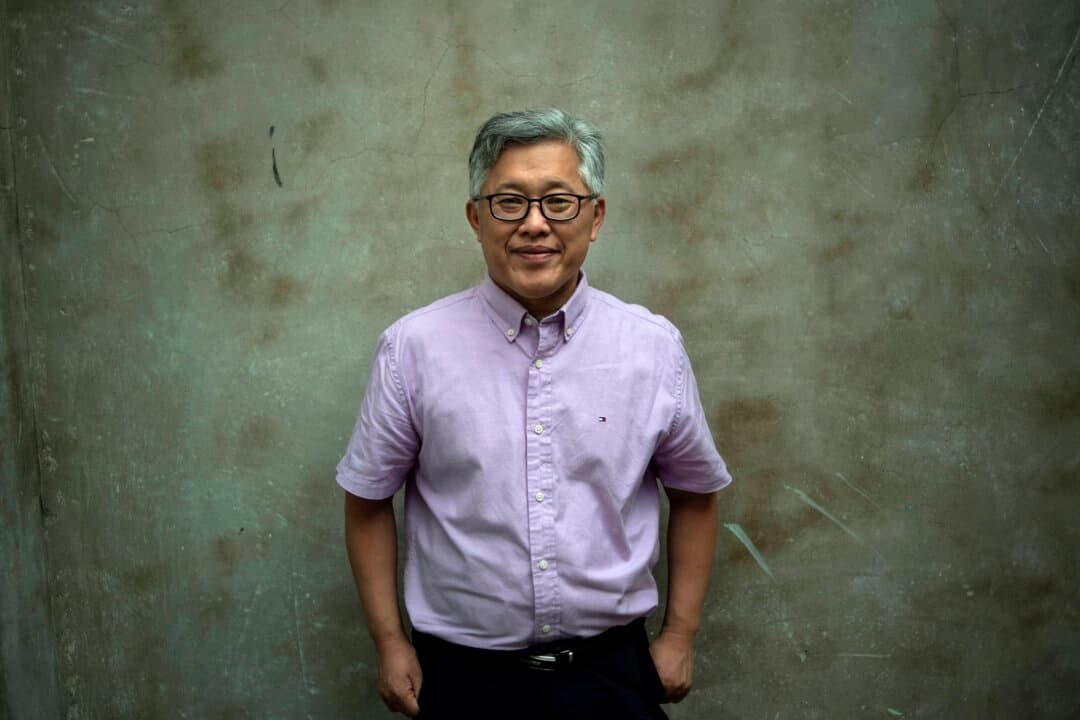 Jin Mingri, pastor principal de la Iglesia Sión, posa en Beijing el 12 de septiembre de 2018. (Fred Dufour/AFP vía Getty Images)