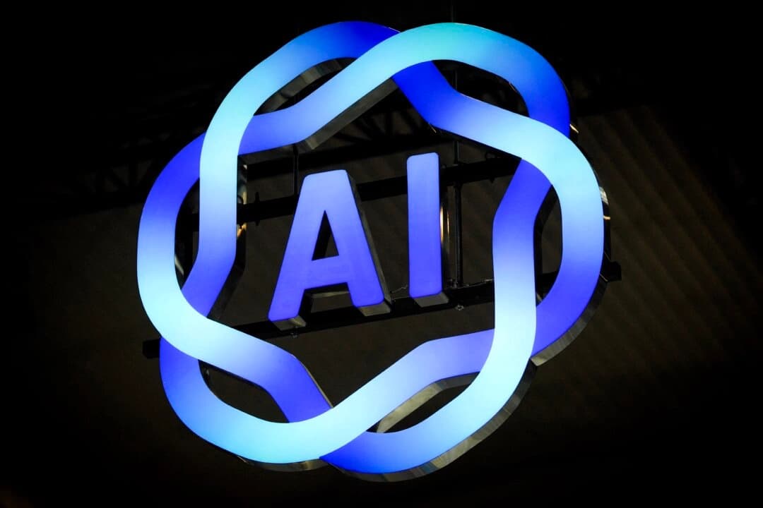 Artificial Intelligence signage is displayed during the Mobile World Congress, the world's largest mobile technology trade show, in Barcelona on March 3, 2025. (Manaure Quintero/AFP).