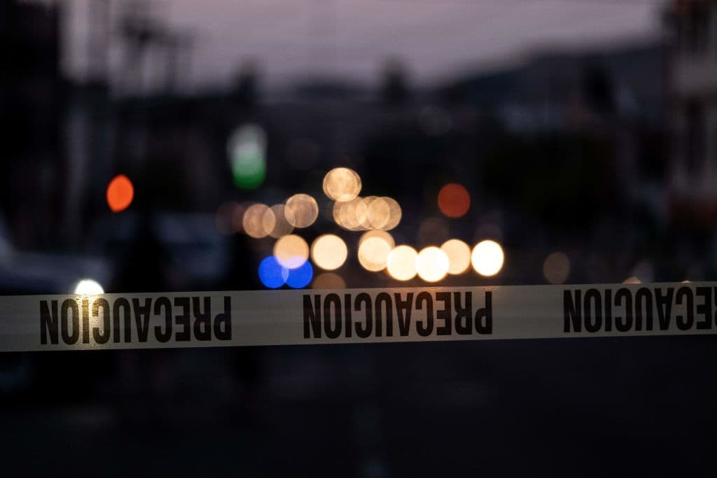 Cinta policial delimita el perímetro de la escena de un crimen en México. Imagen de archivo. (GUILLERMO ARIAS/AFP vía Getty Images)